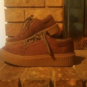 Brown platform tennis shoe